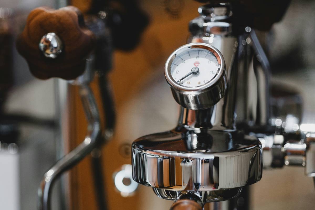 Side-by-side comparison showing quooker pressure relief valve vs standard plastic valve durability